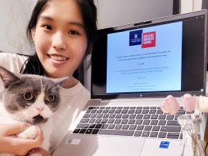 Yao Zhou and cat Tom