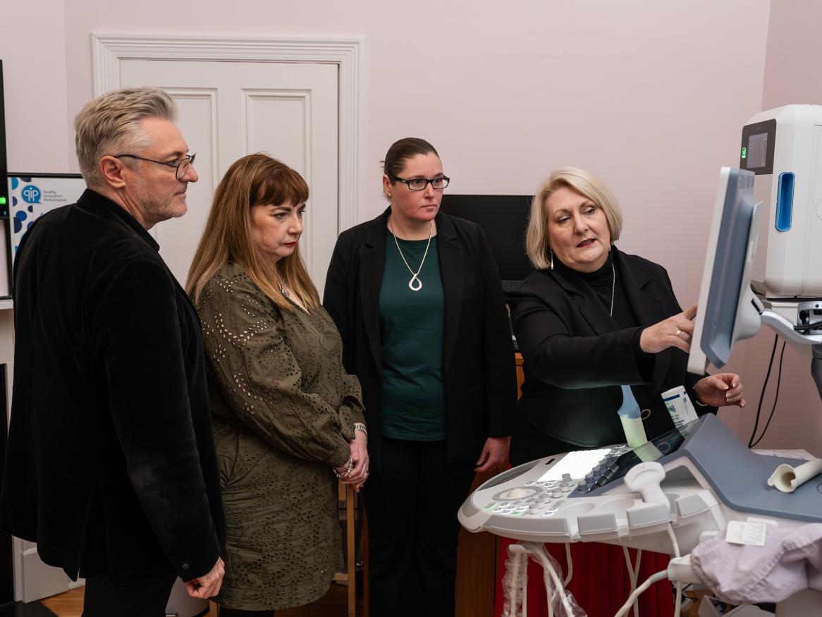 Researchers looking at a ultrasound screen