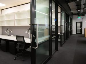 Photo of workspace area in the Australian Institute for Machine Learning