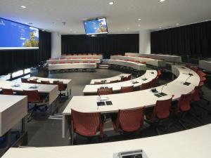 Photo of the interior of the Joe Verco lecture theatre with its round desk configuration