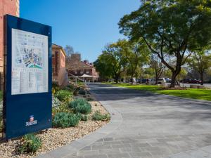 Western Drive directional sign and paving