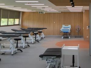 Physiotherapy treatment room with wooden ceiling