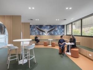 Breakout space in the Medical school with chairs and tables