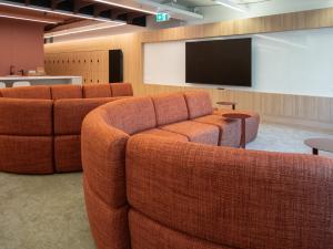HDR Student Hub - plush curved lounge chairs