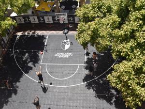 The Cloisters from above with half-court basketball
