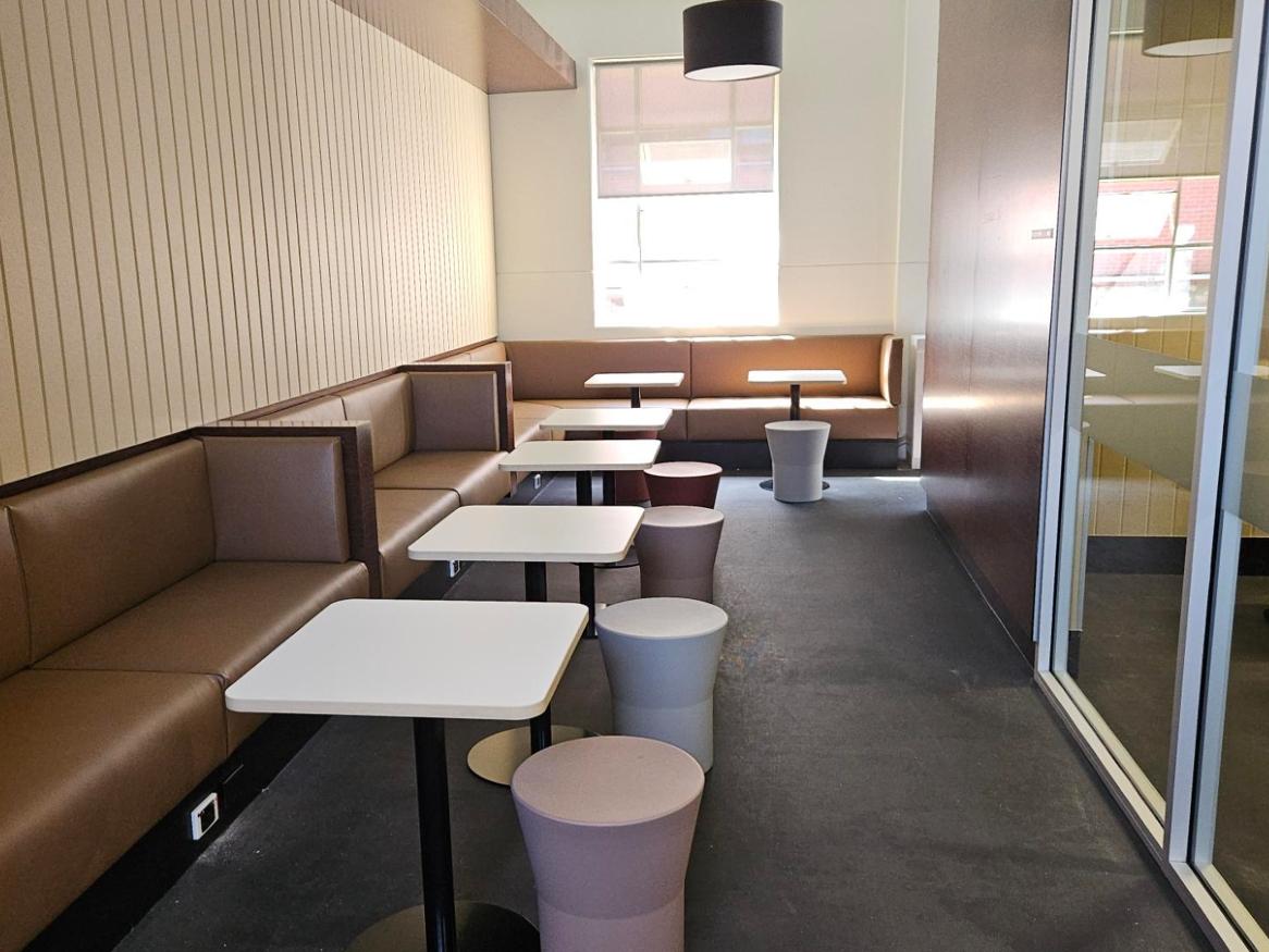 Student lounge in the Mawson building with furniture and storage