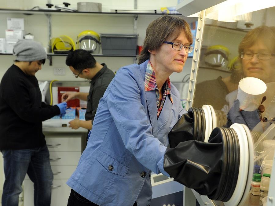 Prof Heike Ebendorff-Heidepriem using a glovebox to fabricate novel glass