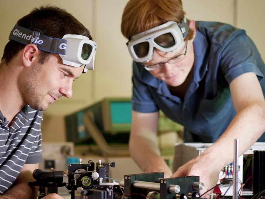 students working on laser set-up