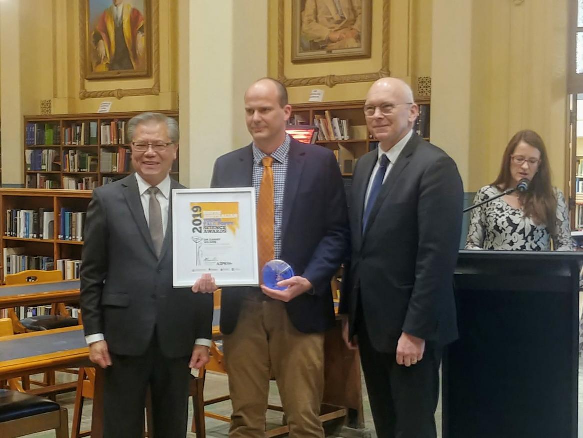 The Hon Hieu Van Le, Governor of South Australia and the Hon David Pisoni MP, SA Minister for Industry and Skills, present Dr Wilson with his award