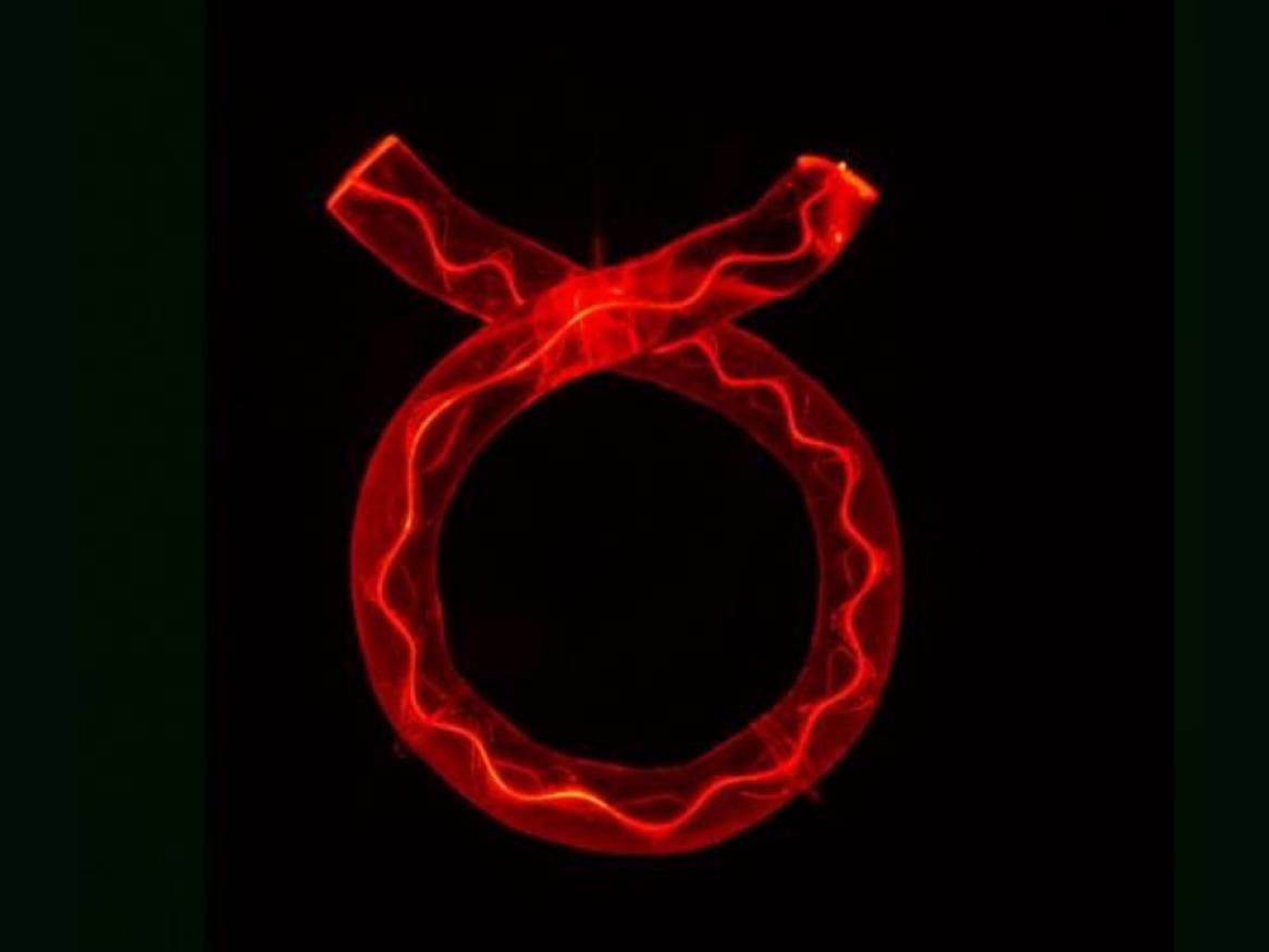 Nanoparticles of diamond in glass glowing red