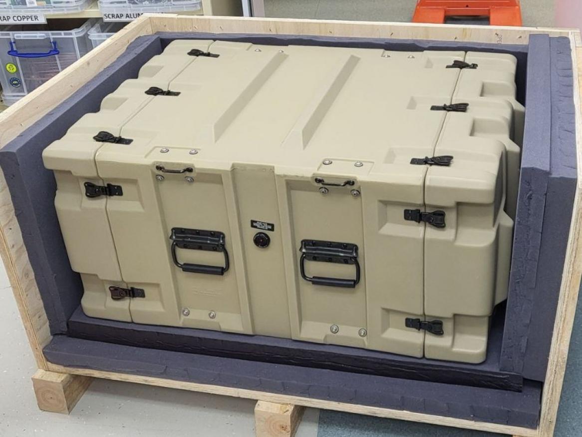 The Portable Atomic Clock TEMPO, manufactured by QuantX packed and ready to go