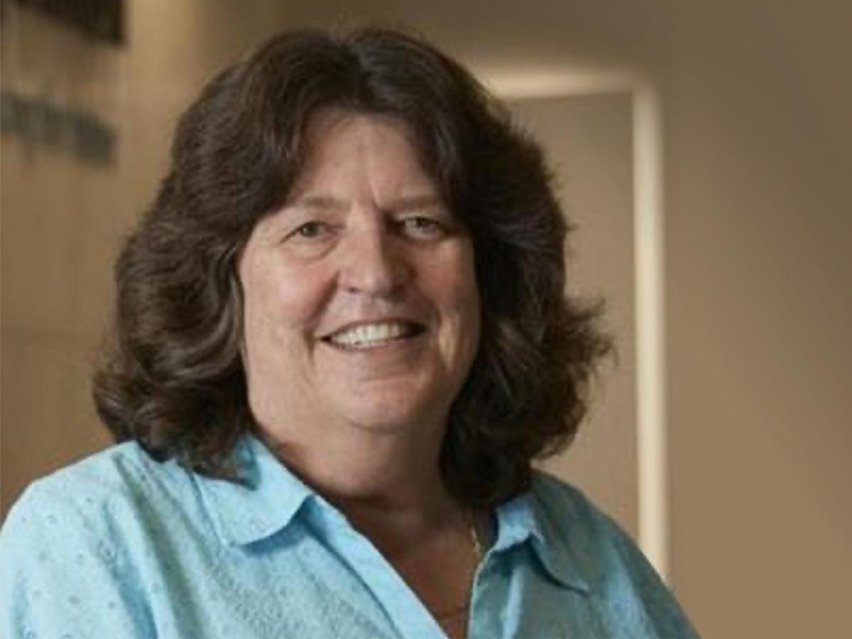 Smiling woman with brown hair