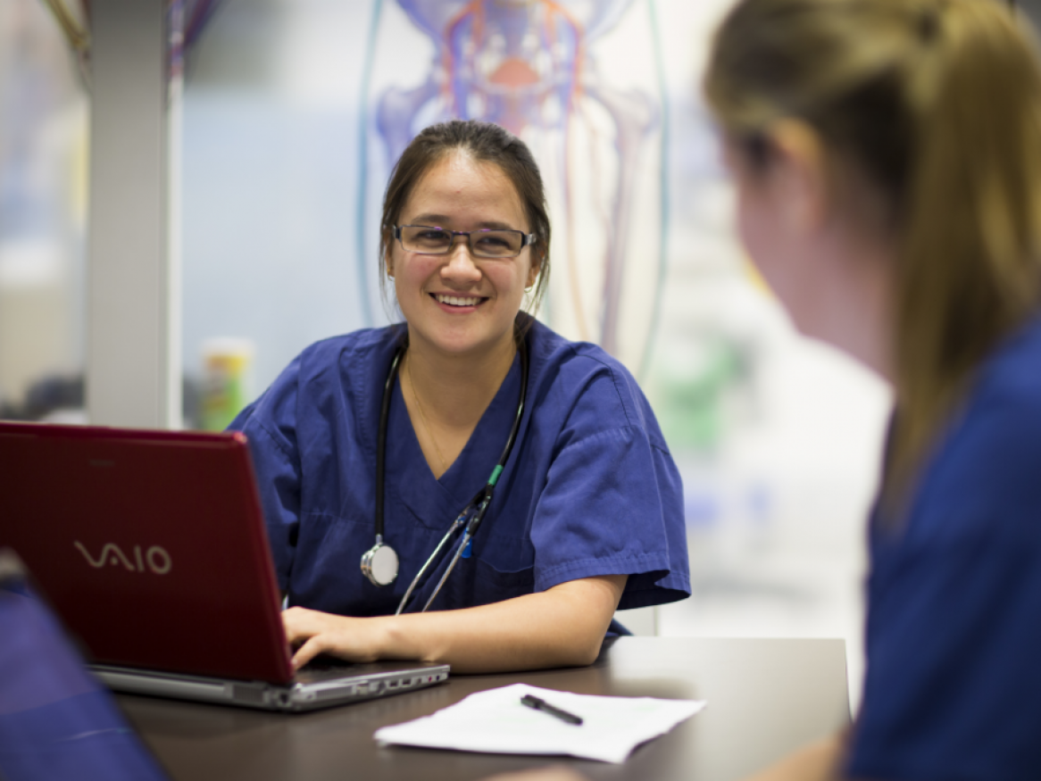 Medial professional with a laptop