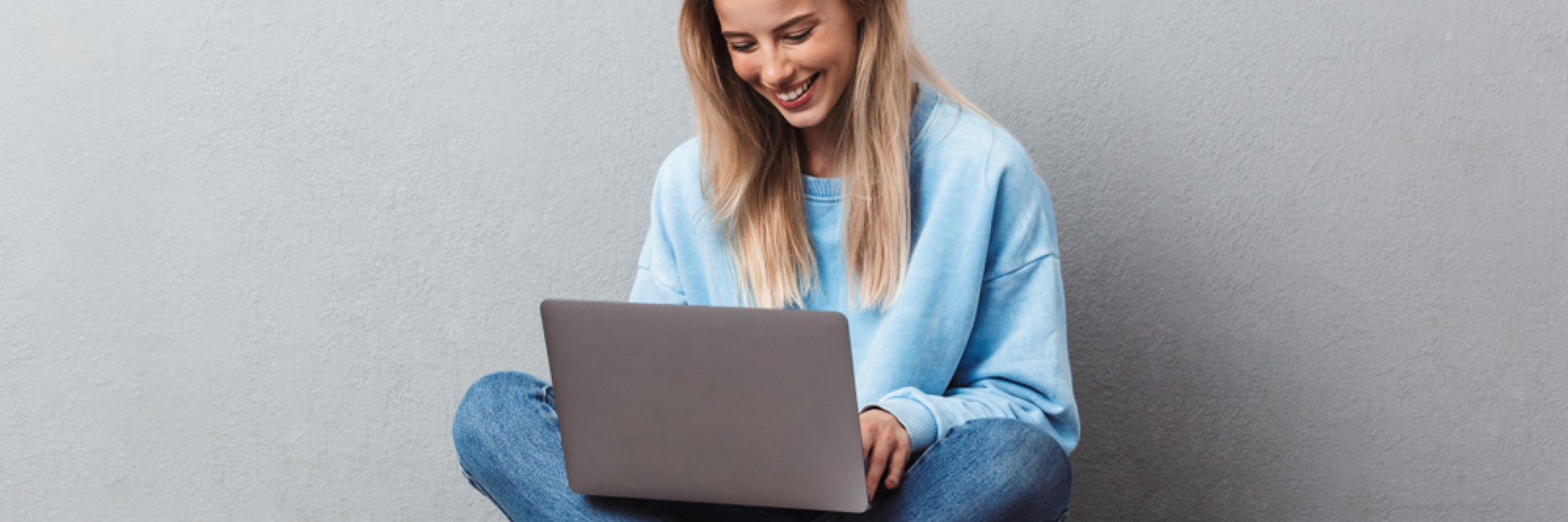 student studying library essentials on a laptop
