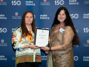 Sophie Oerlemans accepting her award with Jennie Shaw