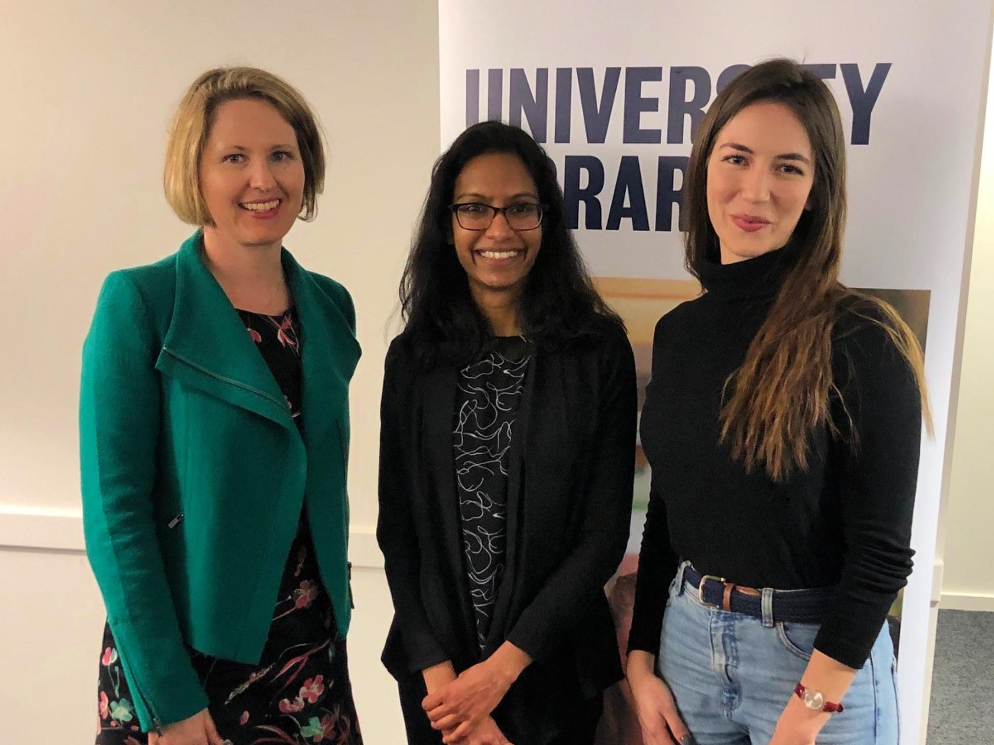 Visualise Your Thesis First Prize winner Danusha Jayawardana (centre), with judge Eva Balan-Vnuk (left) and Third Prize / People's Choice Award winner, Livia Garcez de Oliveira Padilha (right).