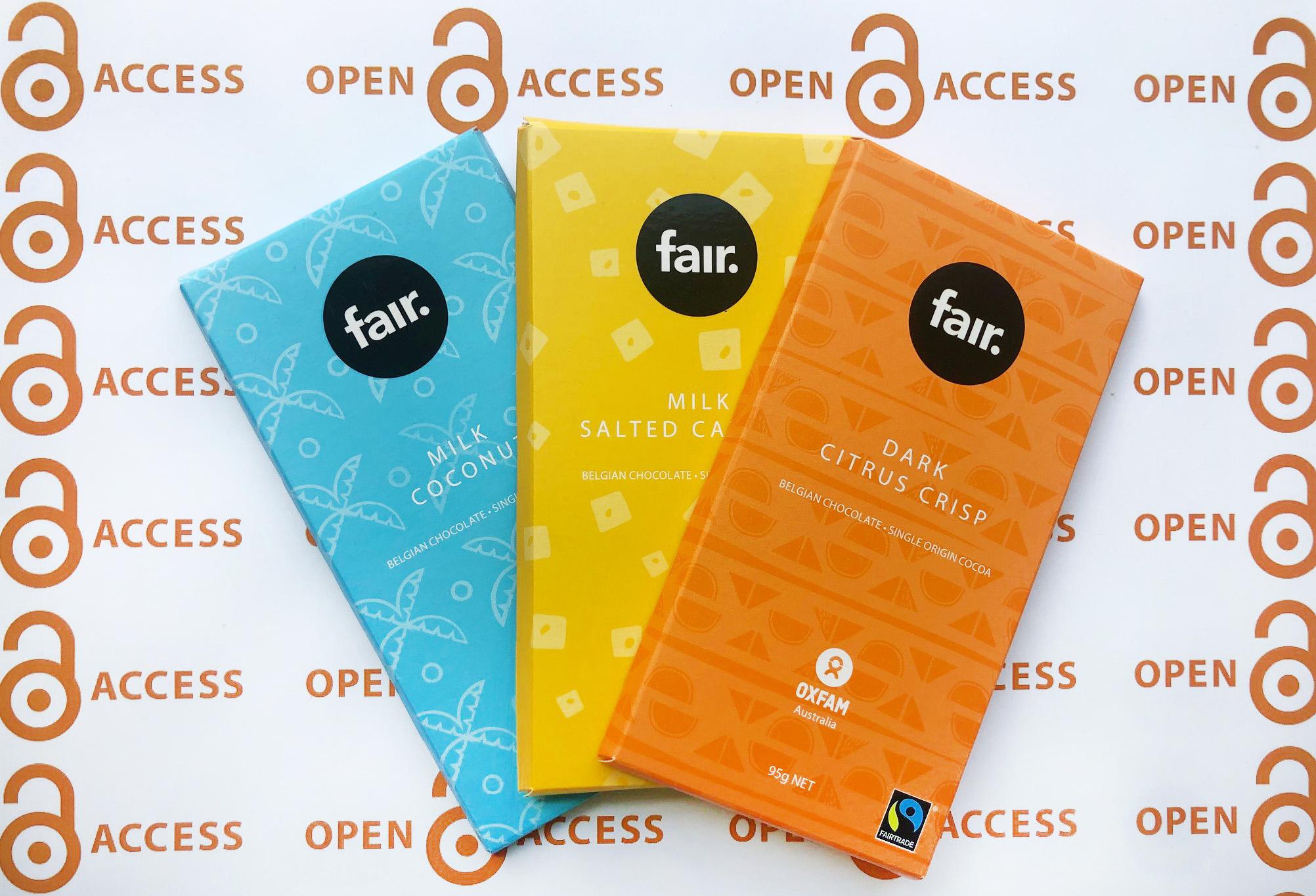 Photo of three blocks of chocolate on top of an open access logo background