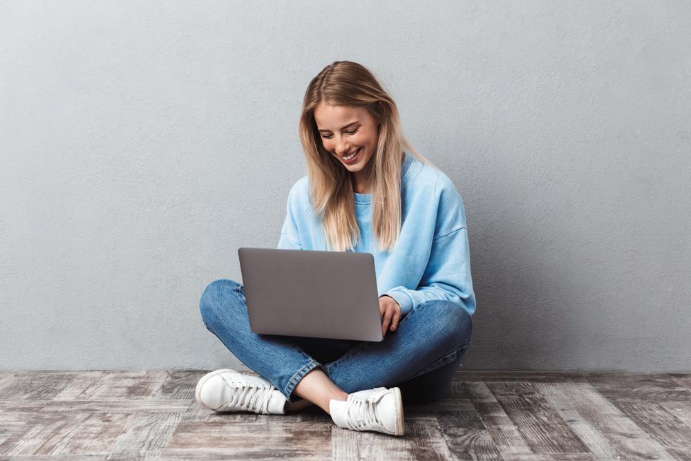 student studying library essentials on a laptop