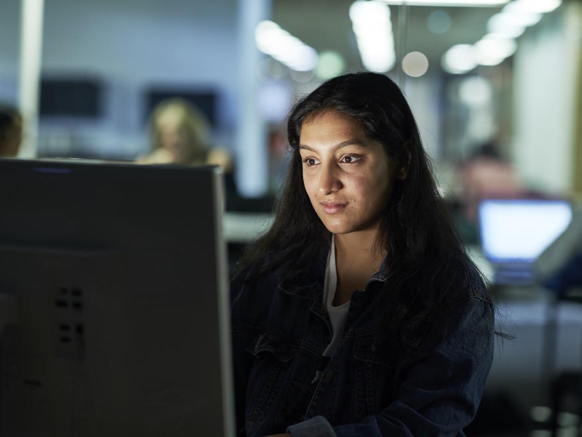 Researcher looking at screen