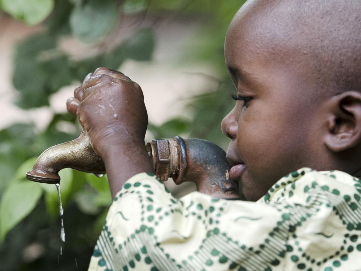 African boy with tap