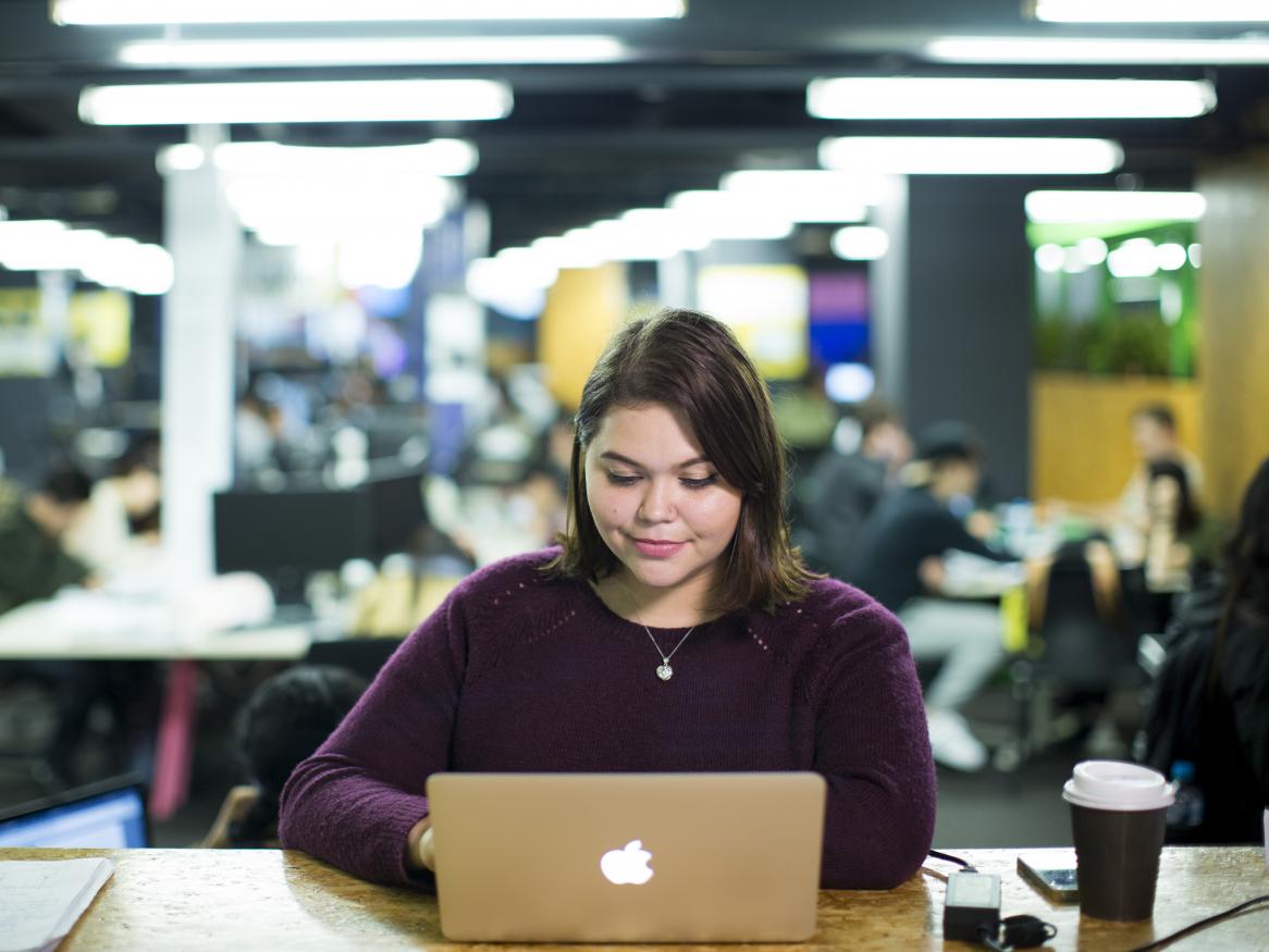 Student studying in the Hub