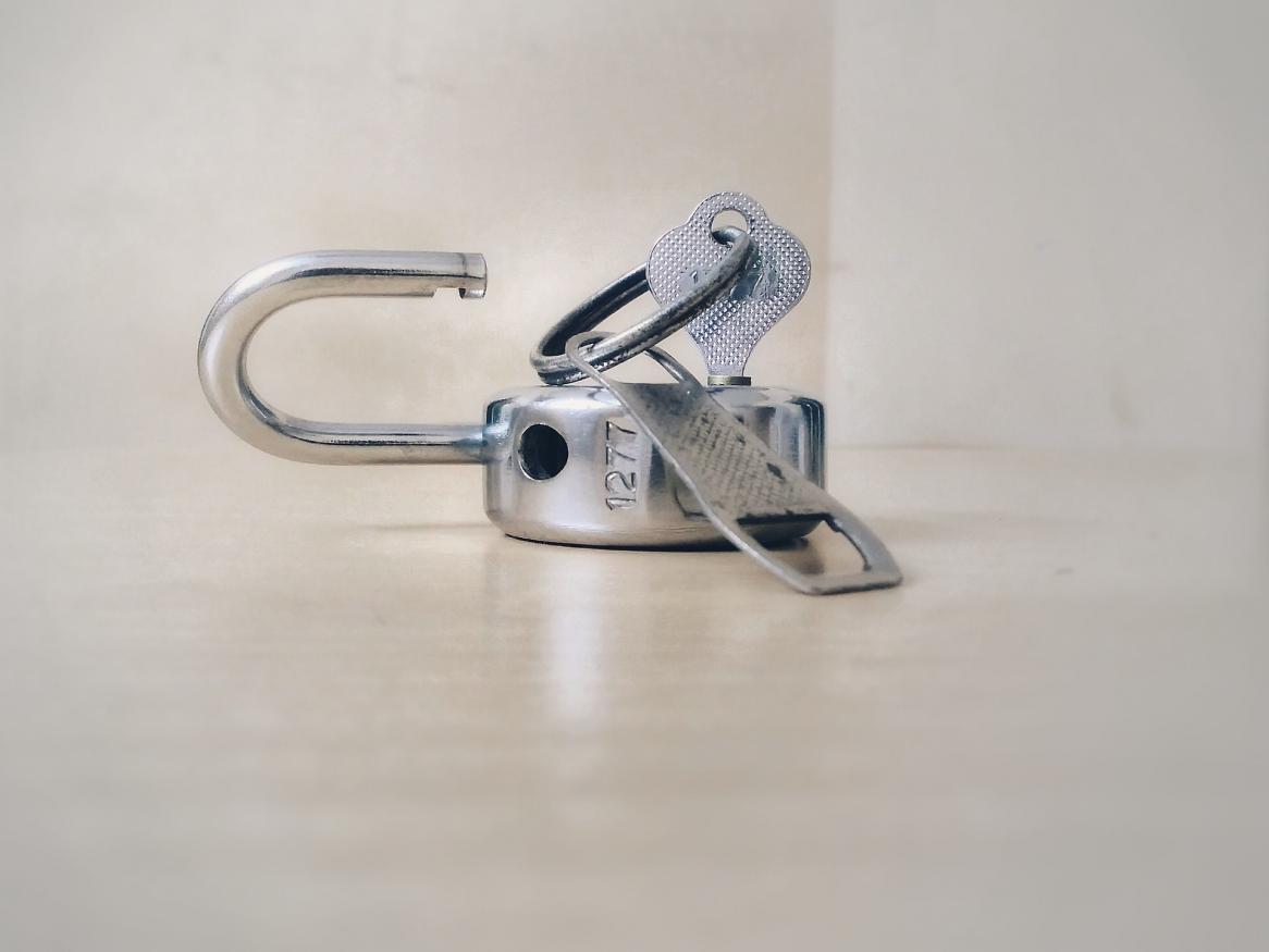 Image shows an unlocked padlock