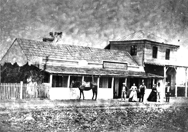 German settlers outside a store.