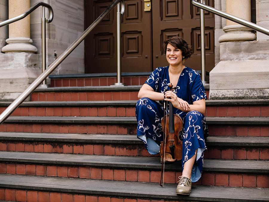 Anna Freer on the steps of Elder Hall