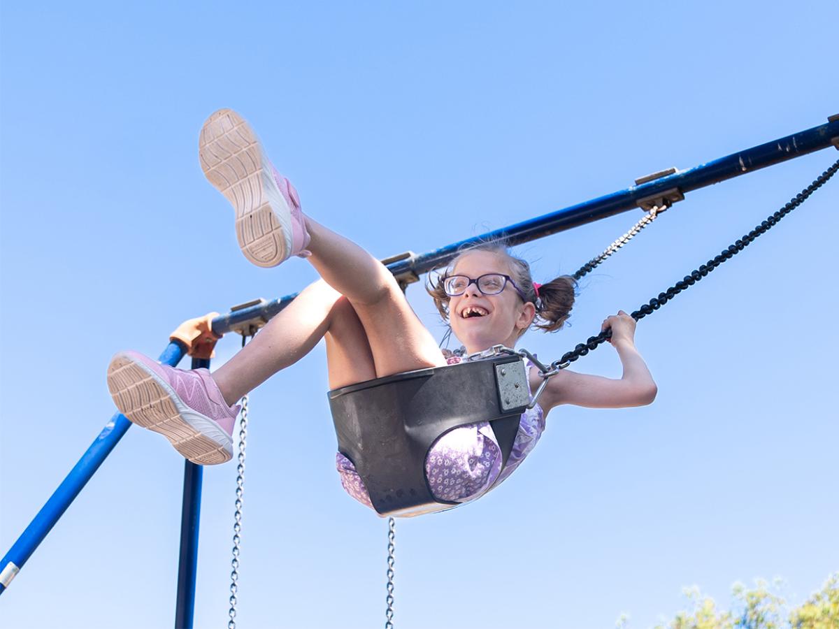 Madeline on swing