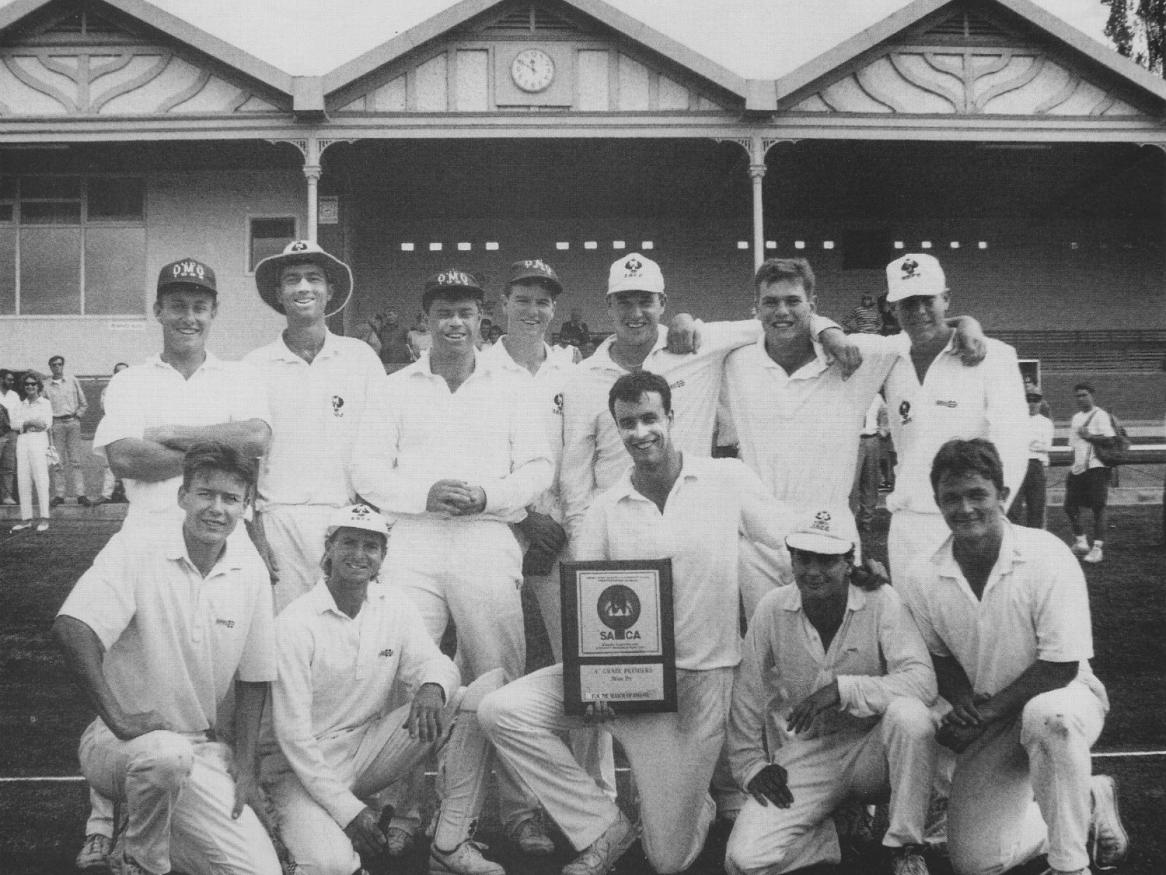 ​​​​​​​Chris Owen (front centre) and the A-grade team he led for a premiership in 1992/93 at the University cricket ground. Photo by Bryan Charlton