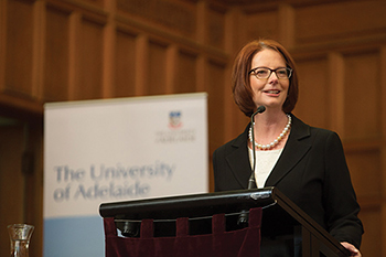 Julia Gillard accepting her 2013 Distinguished Alumni Award
