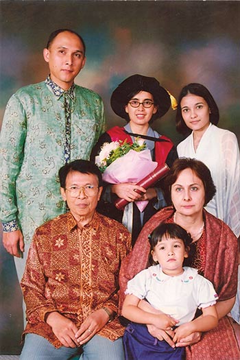 Dr Atmosukarto with family at her PhD graduation