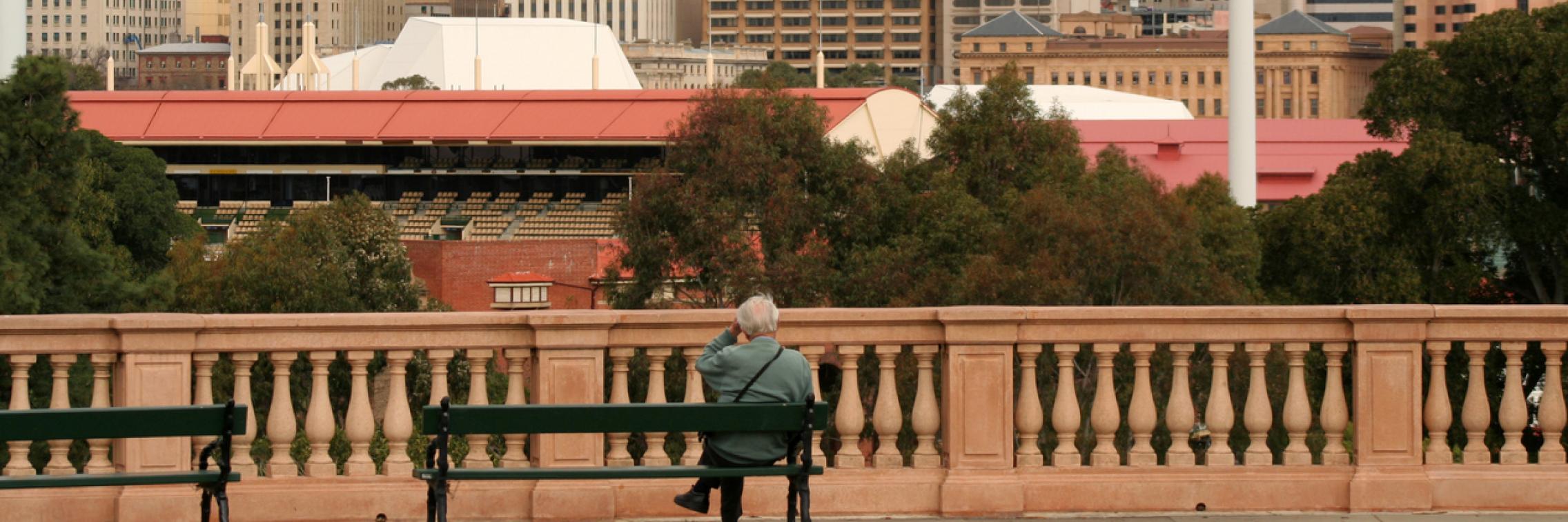 Man takes in the view of Adelaide CBD