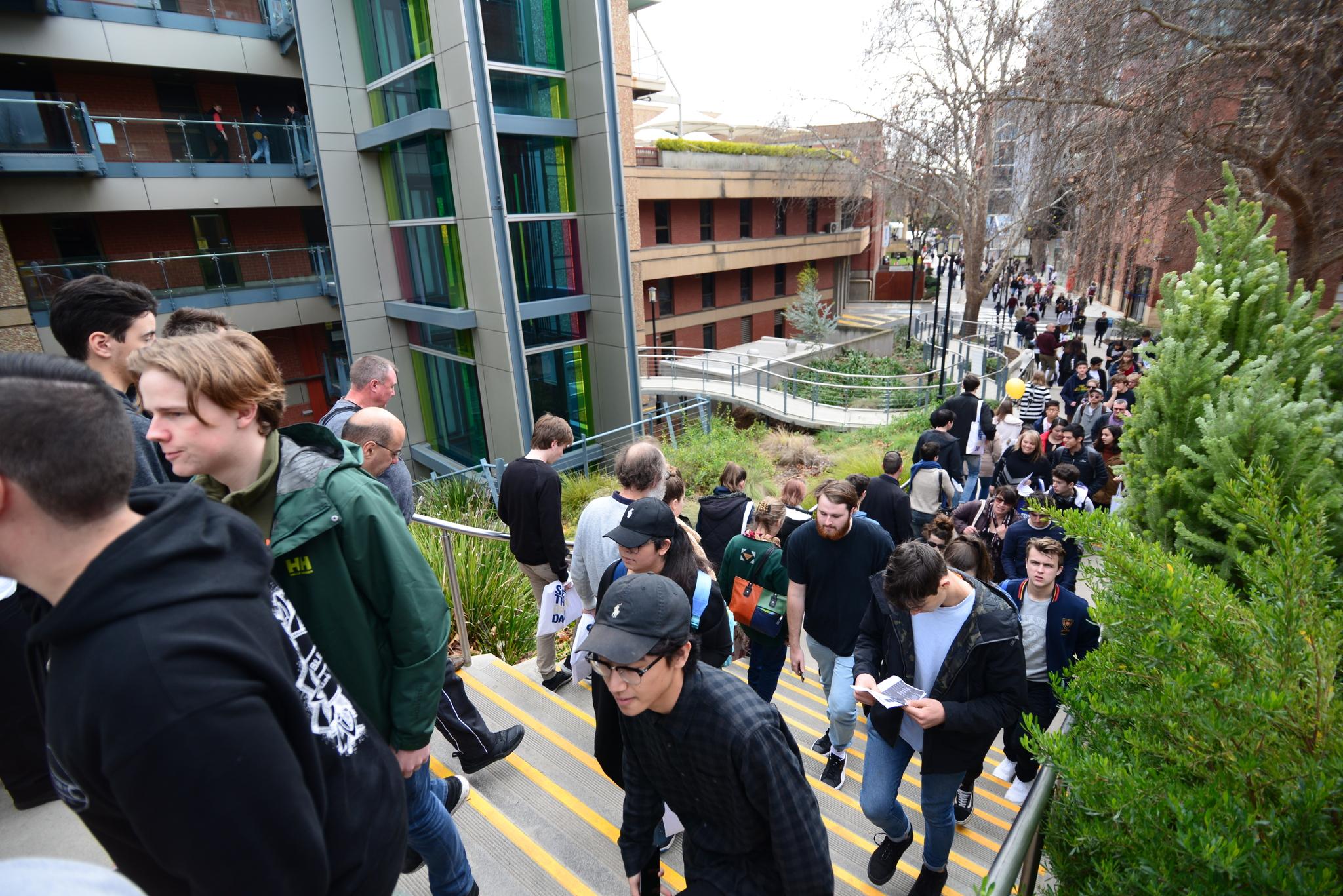 People walking up steps at University of Adelaide
