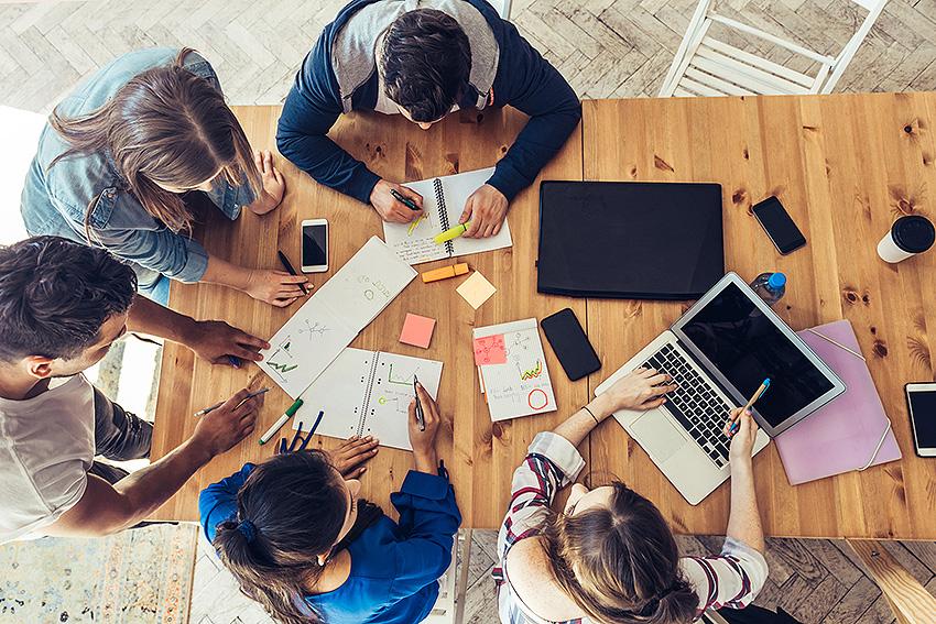 Students studying around a table