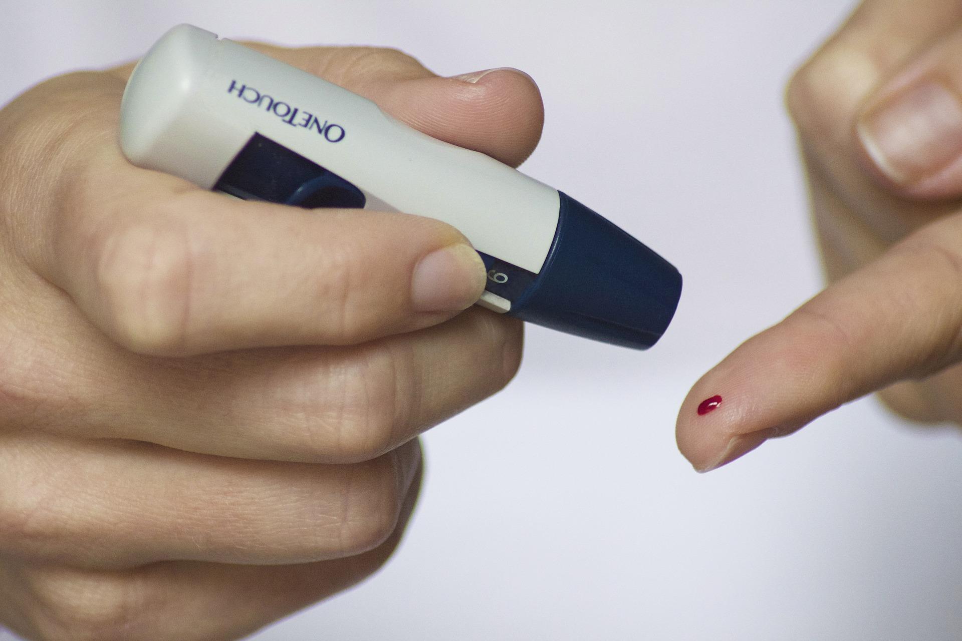 Image of a finger prick test for diabetes