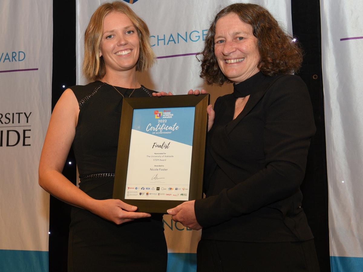 Nicole Foster smiles while accepting the University of Adelaide STEM Award