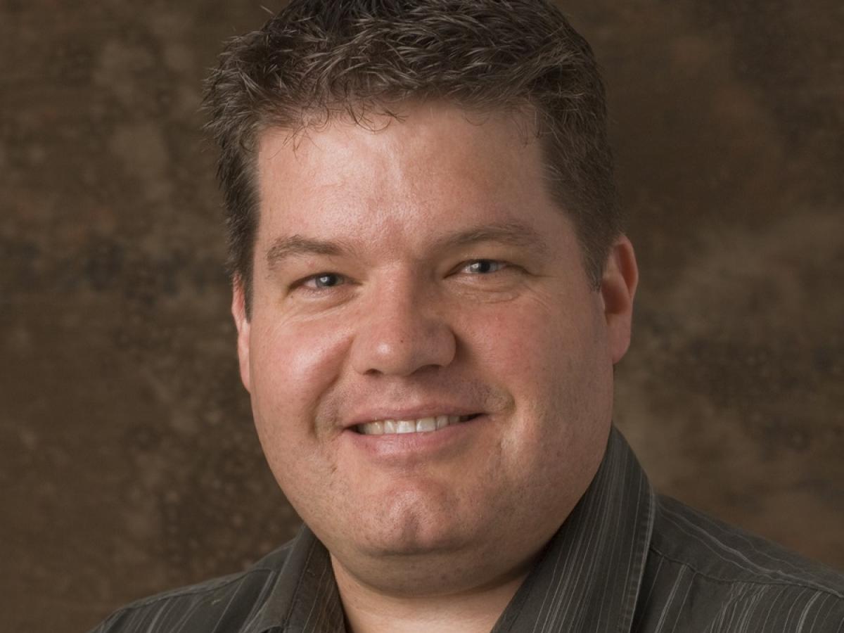 Associate Professor Richard Young smiles into the camera.