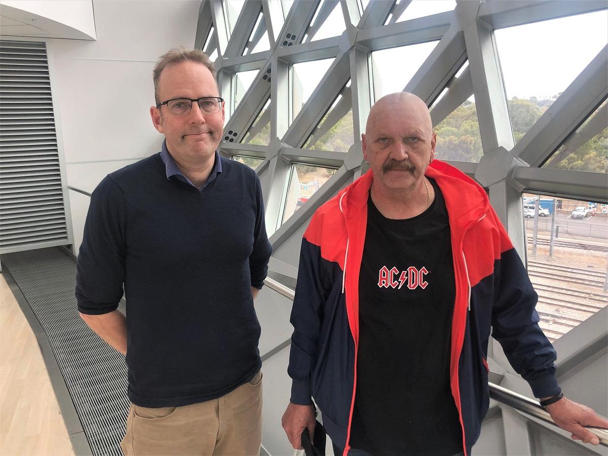 Dr Daniel Thomas and Rolf Suzle stand in front of the camera