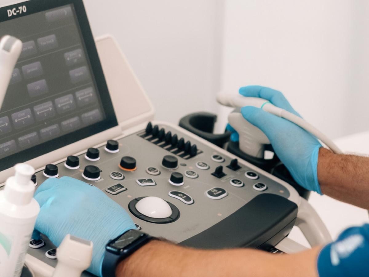 Ultrasound technician with equipment