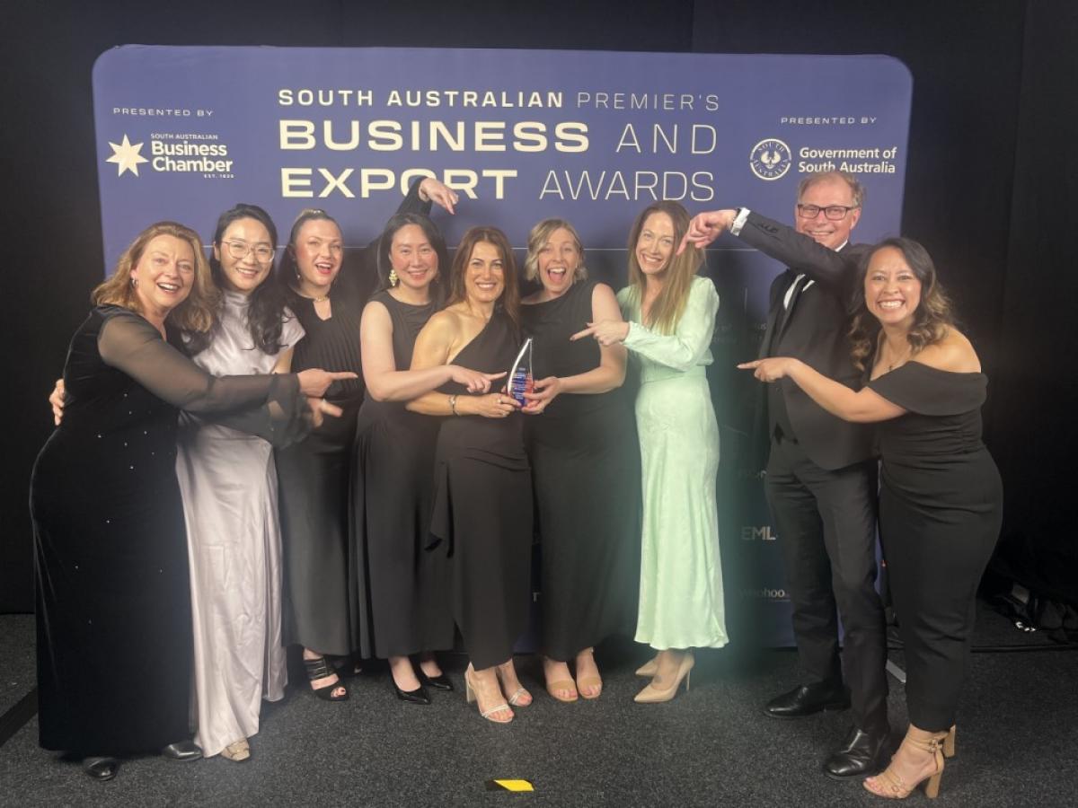 Image of members of the WPDN holding the award at the presentation.