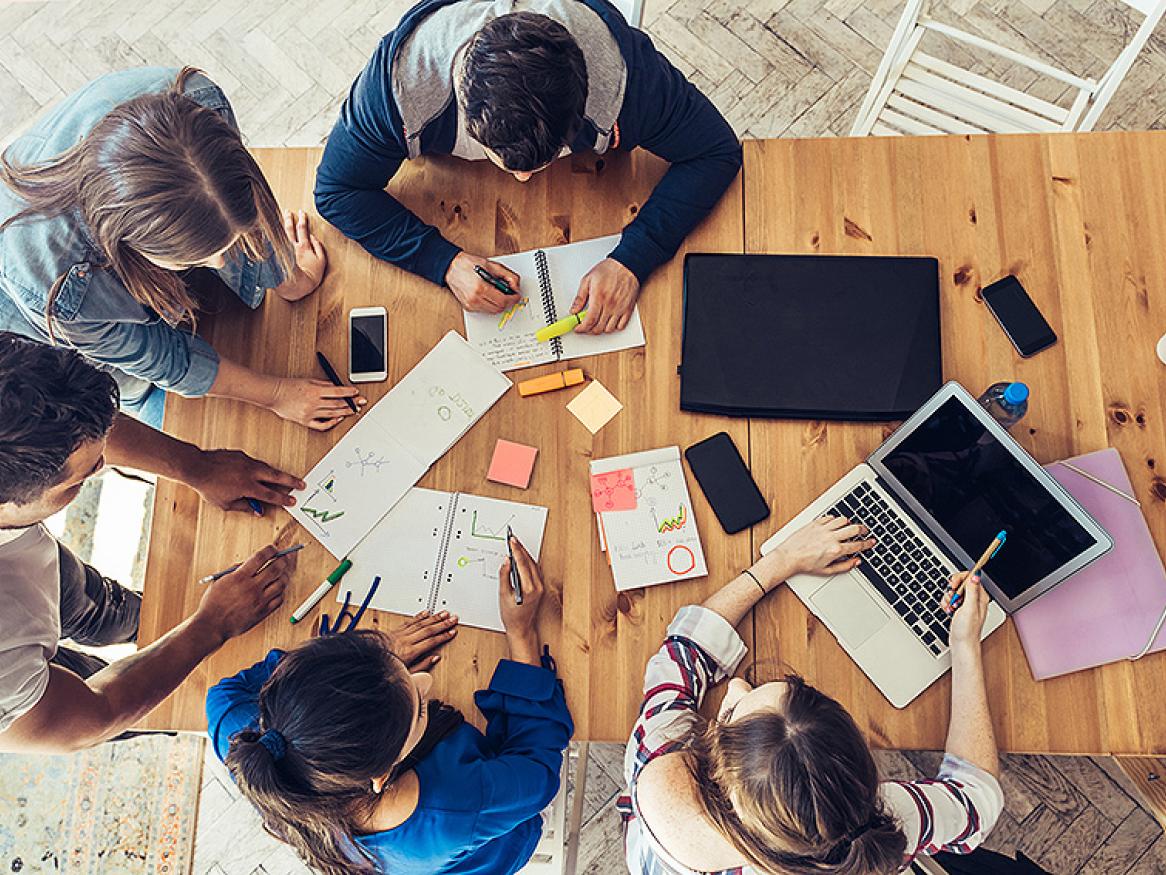 Students studying around a table