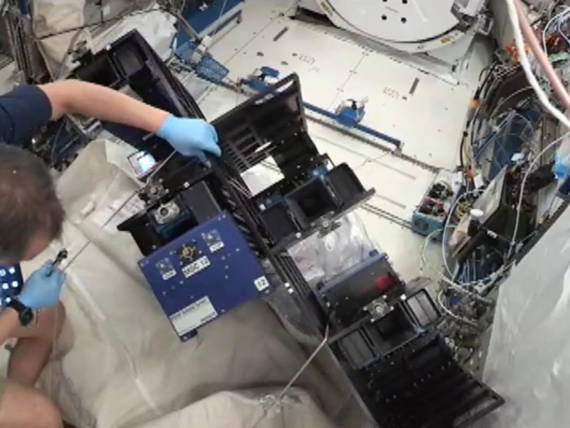 Pills being loaded into a MISSE carrier on board the ISS. Photo NASA