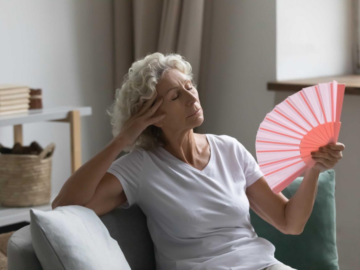 Image of older person beating the heat at home