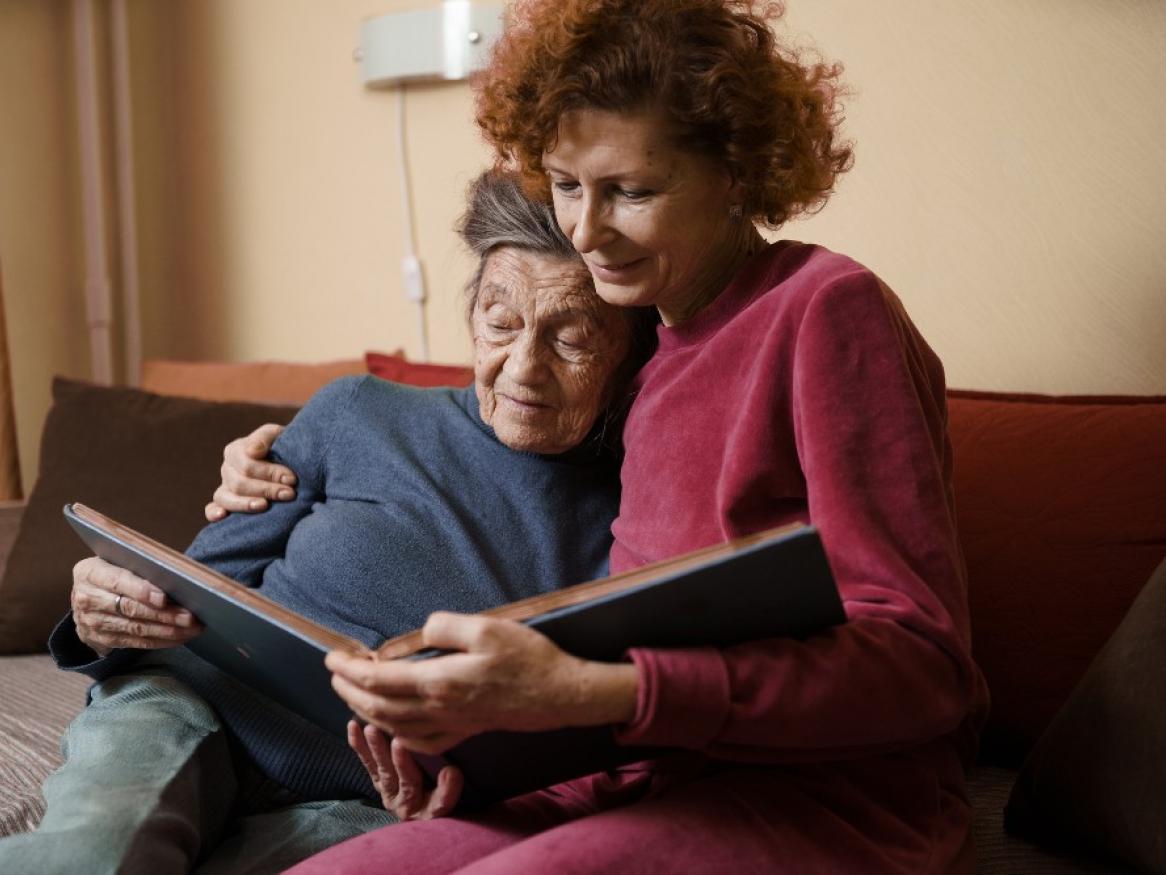 Image of older woman with her carer