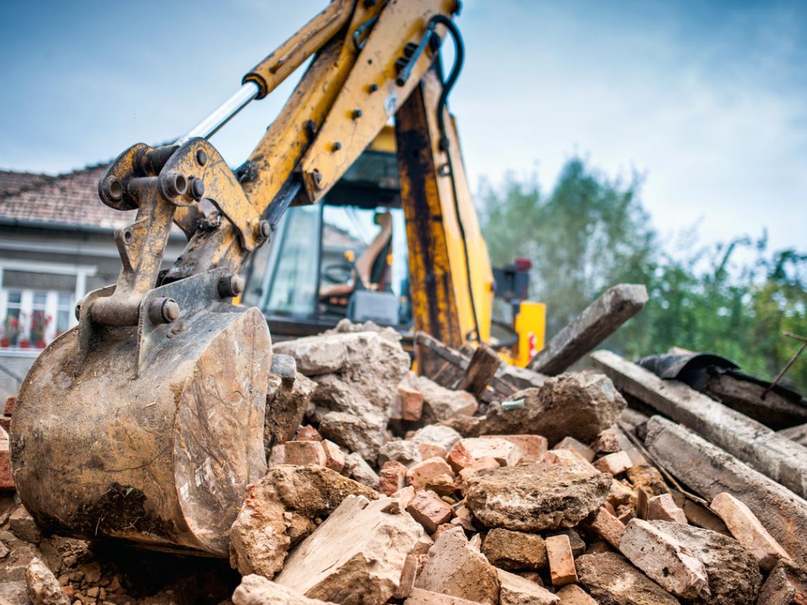 A house in the process of being demolished.