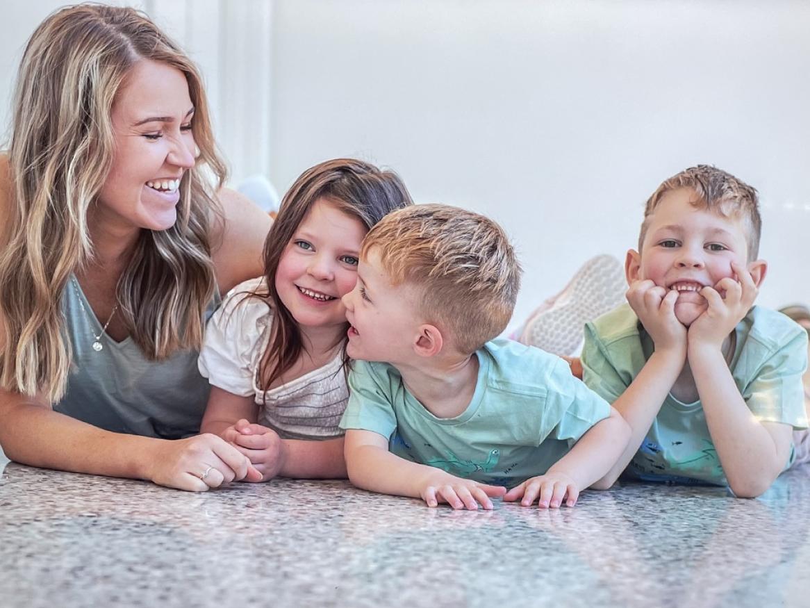 Photo of Renee, Hollie, Austin and Hudson. Renee is mother to Hollie, Austin and Hudson who all have childhood dementia.