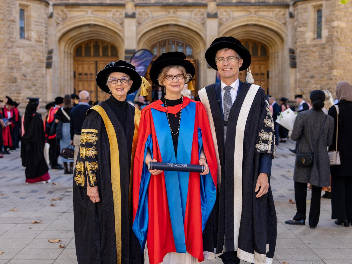 Professor Jane Visvader receives her Honorary Doctorate from Professor Høj AC and the Hon Catherine Branson AC KC outside Bonython Hall.