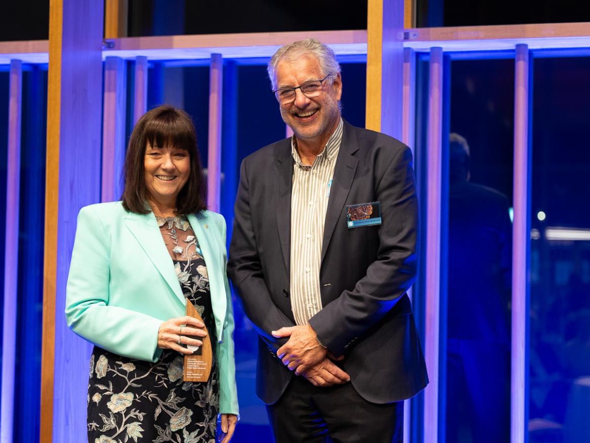 Professor Helen Marshall AM receiving the award, with Professor Steve Wesselingh, CEO of NHMRC - Credit: Hilary Wardhaugh Photography