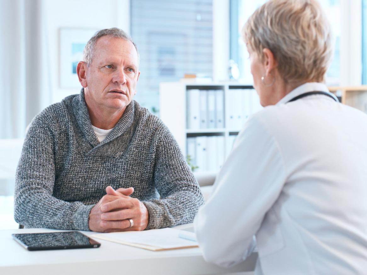 A man talks to a doctor. Credit: Hiraman/iStock